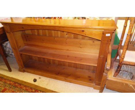 A pine open bookcase of three shelves, an octagonal topped bamboo framed two tier occasional table, a commode and a bamboo oc