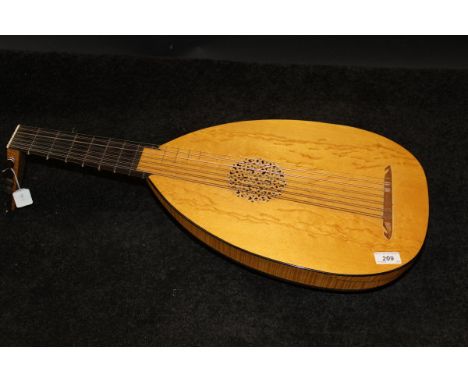 A modern maple lute by Stanley Doubtfire, unsigned CONDITION REPORTS There is no case with this.  Some small  impressed marks