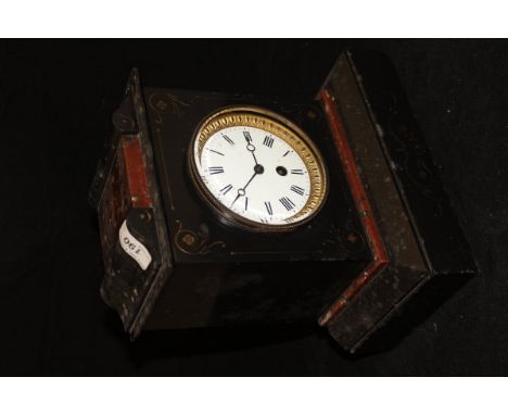 A black and red marble mantle clock with Roman numerals to the enamelled dial, raised on a plinth base