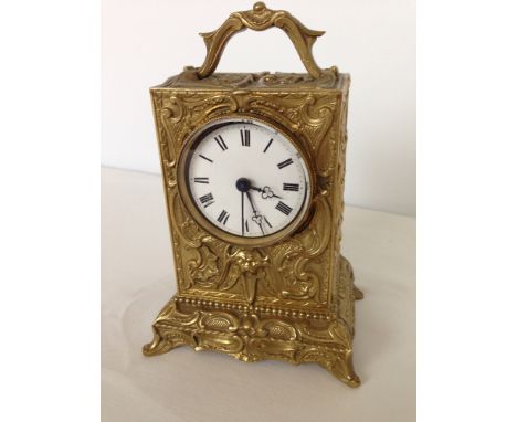 A French brass carriage clock by Henry, Paris.