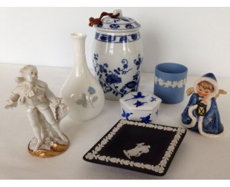 A small quantity of china to include Goebel figure, Capodimonte figure & Wedgwood.