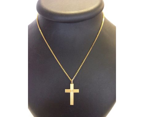 A 9ct gold cross & chain with engine turned engraving, cross measures 3cm long, total weight approx 4gm.