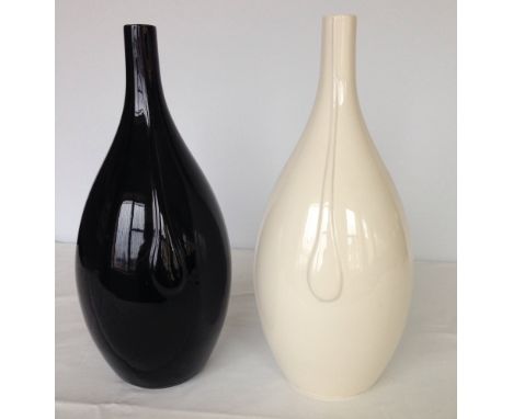 2 Poole Pottery 'Form' vases by Andrew Tanner - one white & one black. Each 38cm tall.