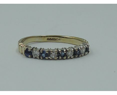 A lady's half eternity ring having five sapphires interspersed by diamond chips in a 9ct gold loop, size L &amp; approx 1.7g