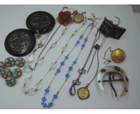 A selection of vintage costume jewellery including yellow wire necklaces, micro mosaic buttons, mother of pearl buckle, rolle