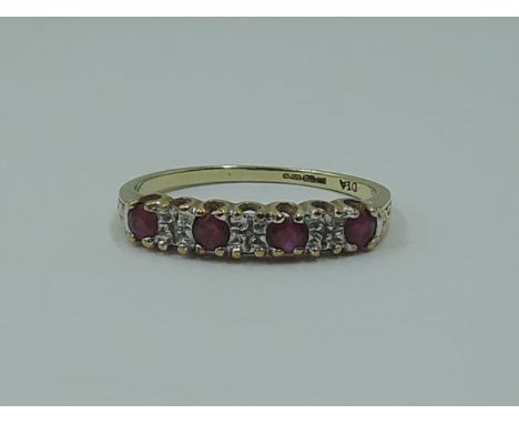 A lady's half eternity ring having four rubies interspersed by diamond chips on a 9ct gold loop, size O/P