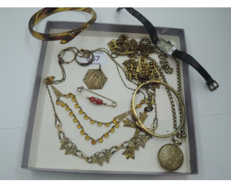 A small selection of vintage rolled gold jewellery including locket, chains, necklaces, hinged bangle, rings etc, a vintage w