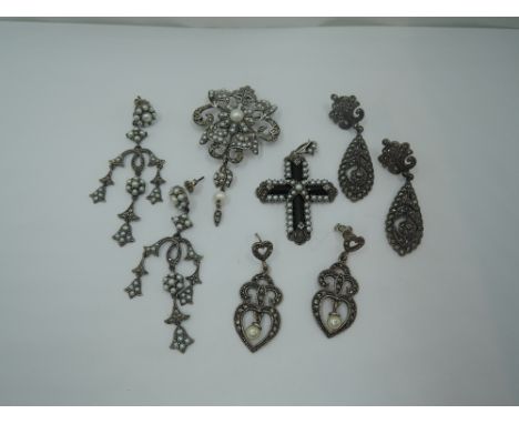 A silver pendant/brooch having marcasite and seed pearl decoration with matched similar earrings, both with Gems TV cards, a 