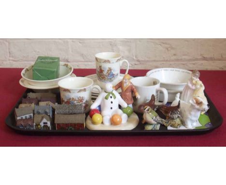 Group of ceramic collectors items including Beswick birds, Royal Doulton figures, Coalport snowman, Wade village models and D