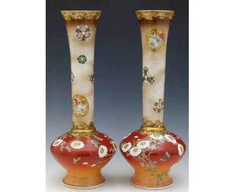 Pair of Japanese Kinkozan long necked vases painted in enamels and gosu blue and green with flowers, signed Kinkozan sei  in 