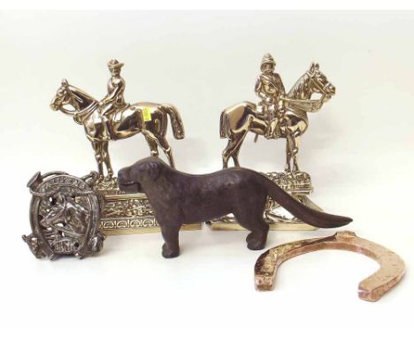 Pair of brass horse and rider door stops, copper horse hoof, iron 'Tally Ho' money bank and a dog nut cracker. Condition repo