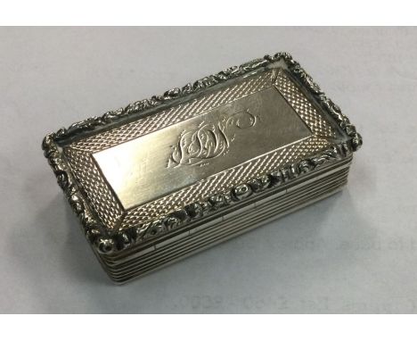 A large William IV silver snuff box with chased decoration. Birmingham 1835. By Francis Clark. Approx. 38 grams. Est. £180 - 