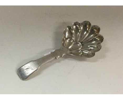A George III silver caddy spoon. Birmingham 1832. By John Tongue. Approx. 9 grams. Est. £50 - £80.