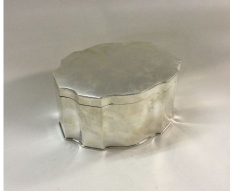 A heavy silver tea caddy. London 1918. By Goldsmiths &amp; Silversmiths. Approx. 469 grams. Est. £600 - £800.