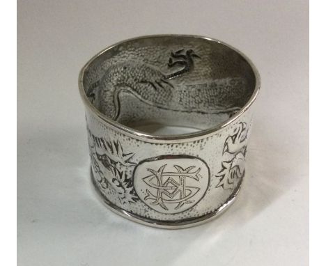 A good Chinese silver napkin ring. Punched to interior. Approx. 29 grams. Est. £30 - £40.