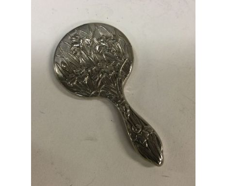 A Japanese silver mirror. Approx. 67 grams. Est. £50 - £80.