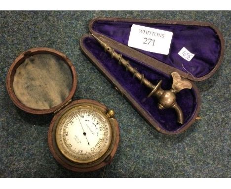 A leather cased thermometer etc.