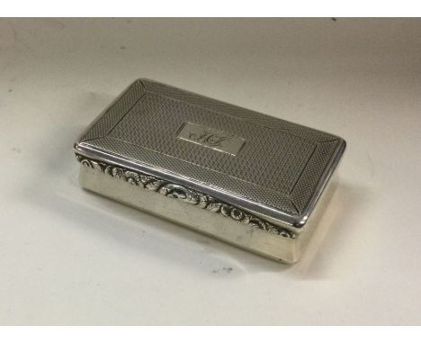 A fine quality silver table snuff box with engine turned decoration. Birmingham 1827. By William Simpson. Approx. 65 grams. E