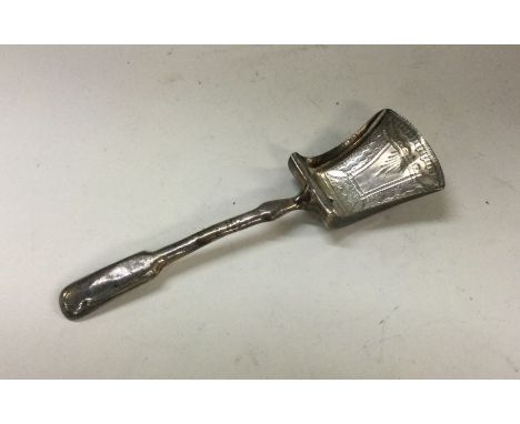 A George III bright cut silver caddy spoon. Approx. 9 grams. Est. £20 - £30.
