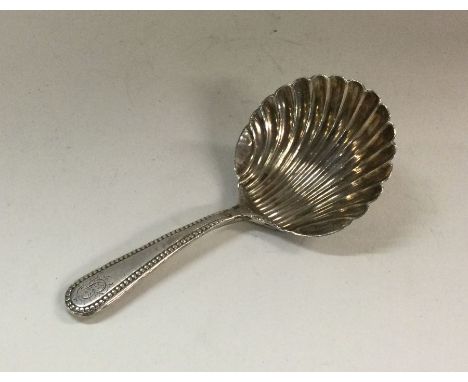 A George III silver caddy spoon. London 1807. By William Burch. Approx. 14 grams. Est. £50 - £80.