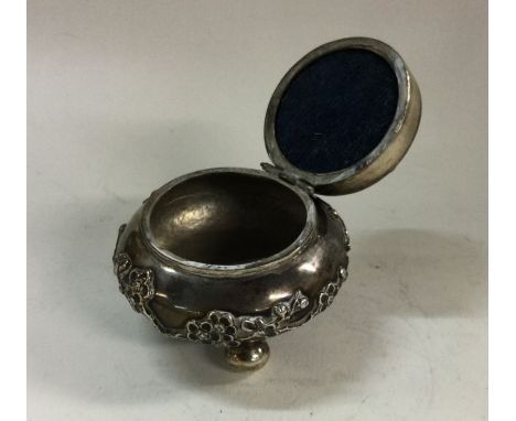 LUEN HING: A Chinese silver jewellery box with chased bird decoration. Approx. 60 grams. Est. £100 - £150.