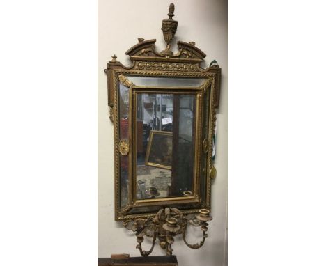 An Antique gilt framed mirror.