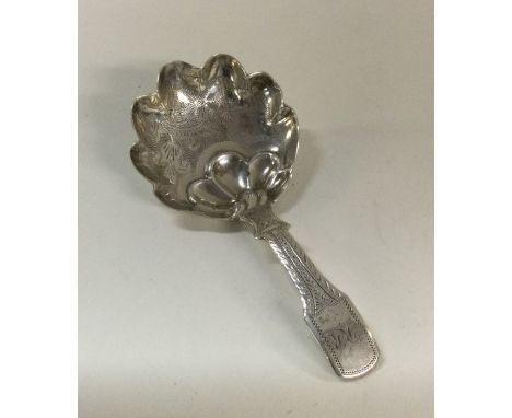 A George III bright cut silver caddy spoon. Birmingham 1833. By John Lawrence. Approx. 9 grams. Est. £50 - £80.