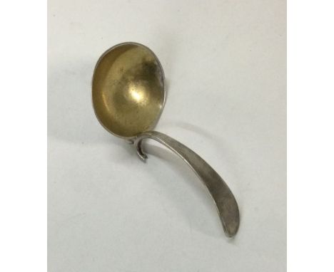 An unusual George III silver caddy spoon. London 1810. Approx. 9 grams. Est. £45 - £50.