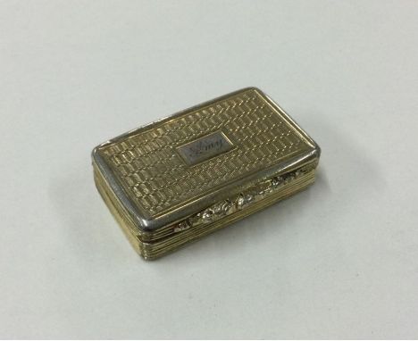 A George III silver gilt engine turned vinaigrette with cast opening. London. By Thomas Shaw. Approx. 25 grams. Est. £200 - £