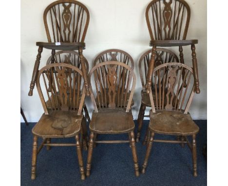 A good set of eight stick back chairs.