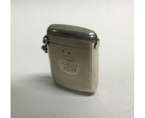 CHESTER: A good engine turned silver vesta case with hinged cover. Approx. 28 grams. Est. £30 - £40.