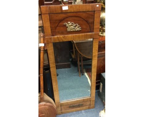 A continental framed mirror.