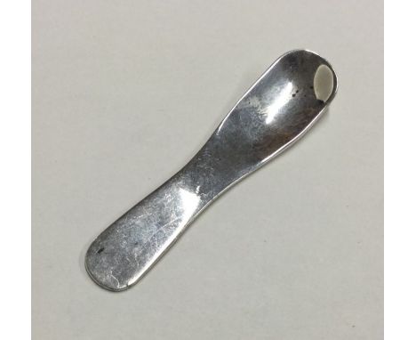 A stylish silver caddy spoon. London. By TP. Approx. 14 grams. Est. £30 - £40.