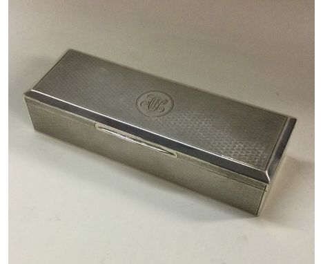 A heavy engine turned silver box. London 1918. Approx. 198 grams. Est. £150 - £180.