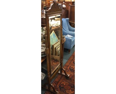 A mahogany dressing mirror.