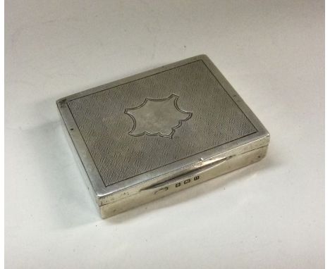 A good quality engine turned silver hinged top box. Approx. 35 grams. Est. £25 - £35.