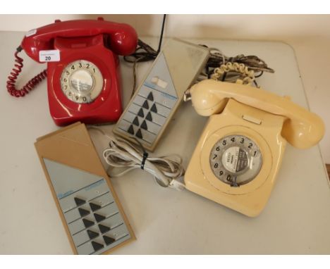 Two GPO746 Rotary Dial telephones circa 1970, one red and one cream 