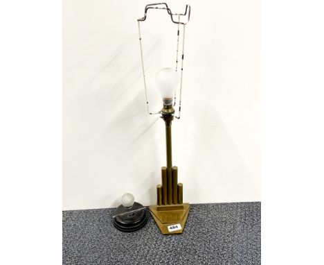 A 1930's brass table lamp and a Sted Co golf lamp.