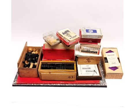 A group of vintage games, including turned wooden chess set.