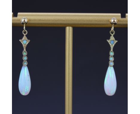 A pair of 9ct yellow gold opal set drop earrings, L. 2.6cm.