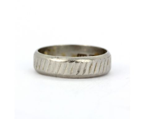 A hallmarked platinum (worn hallmark) ring, (M.5), approx. 5.4gr. .&nbsp;