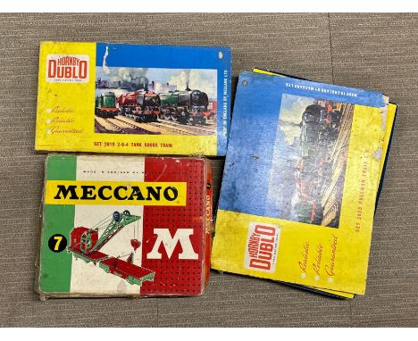A group of vintage Meccano and Hornby '00' gauge boxed items.