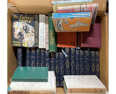 A box of vintage books.