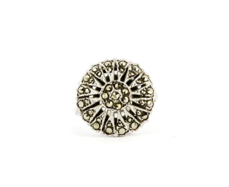 A silver marcasite set cluster ring, (M).