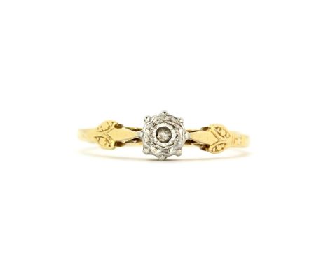 An antique 18ct yellow and white gold solitaire ring set with a brilliant cut diamond, ring size L.