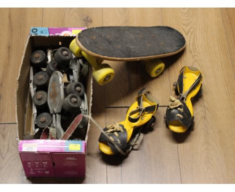 Box of roller skates and skateboard