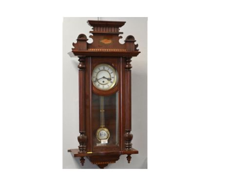 Wall clock with boxwood inlay