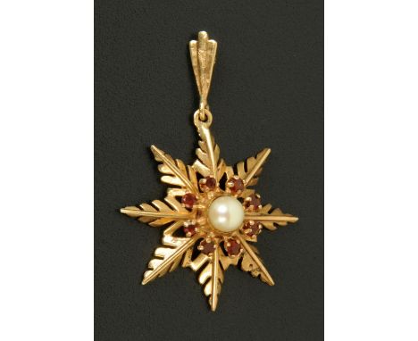 A 9 ct gold snowflake pendant, set with central pearl framed by small garnets.