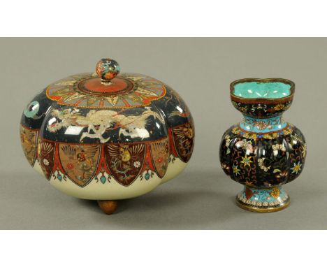 A Japanese Cloisonne pot and cover, Meiji period, trefoil shape with geometric collar, the shoulder with dragons against a bl