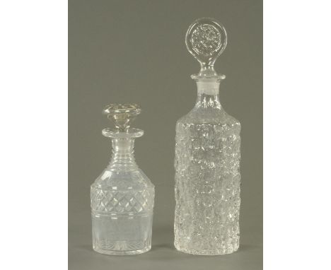 A Whitefriars cracked ice decanter with stopper, and a Georgian decanter.  Tallest 35 cm. 